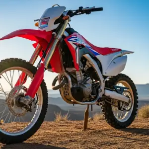2026 Honda CRF300F parked on a sunlit desert overlook at golden hour