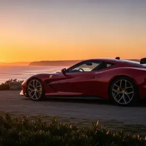 Ferrari SC40 parked on a coastal overlook at sunset