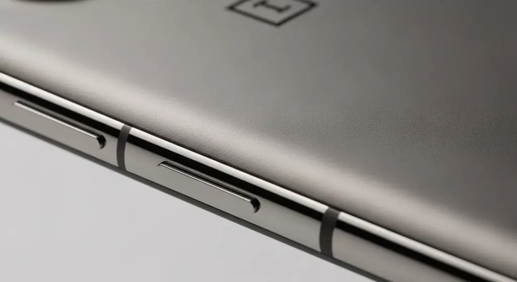 Macro close-up of OnePlus 15 Sand Storm edition frame texture, matte MAO-coated finish with visible grain