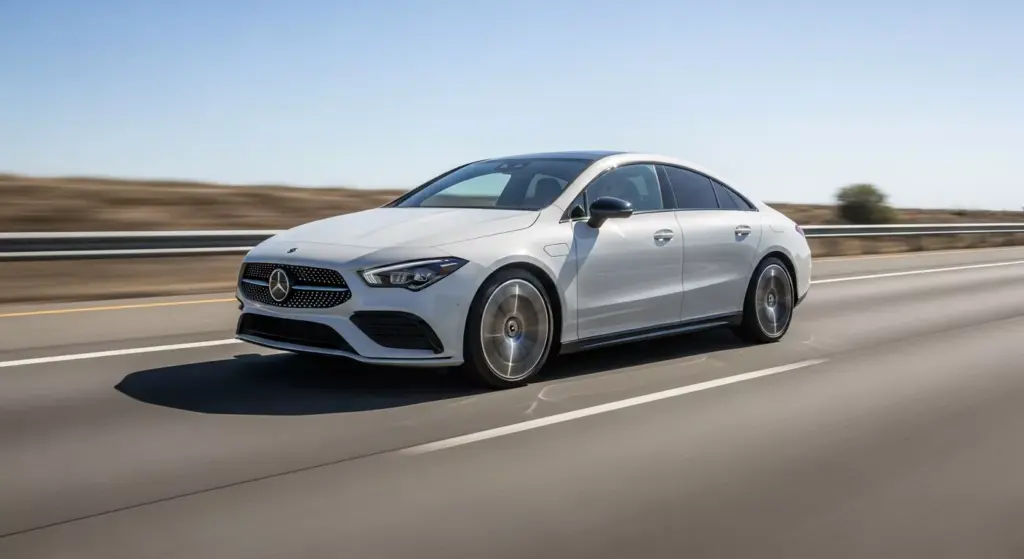 2026 Mercedes-Benz CLA with EQ Technology in motion on a U.S. highway, dynamic rolling shot, high-speed EV acceleration.