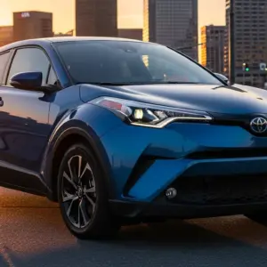 Toyota C-HR+ EV 2026, sleek futuristic electric crossover parked outdoors, glossy metallic paint, sharp LED headlights.
